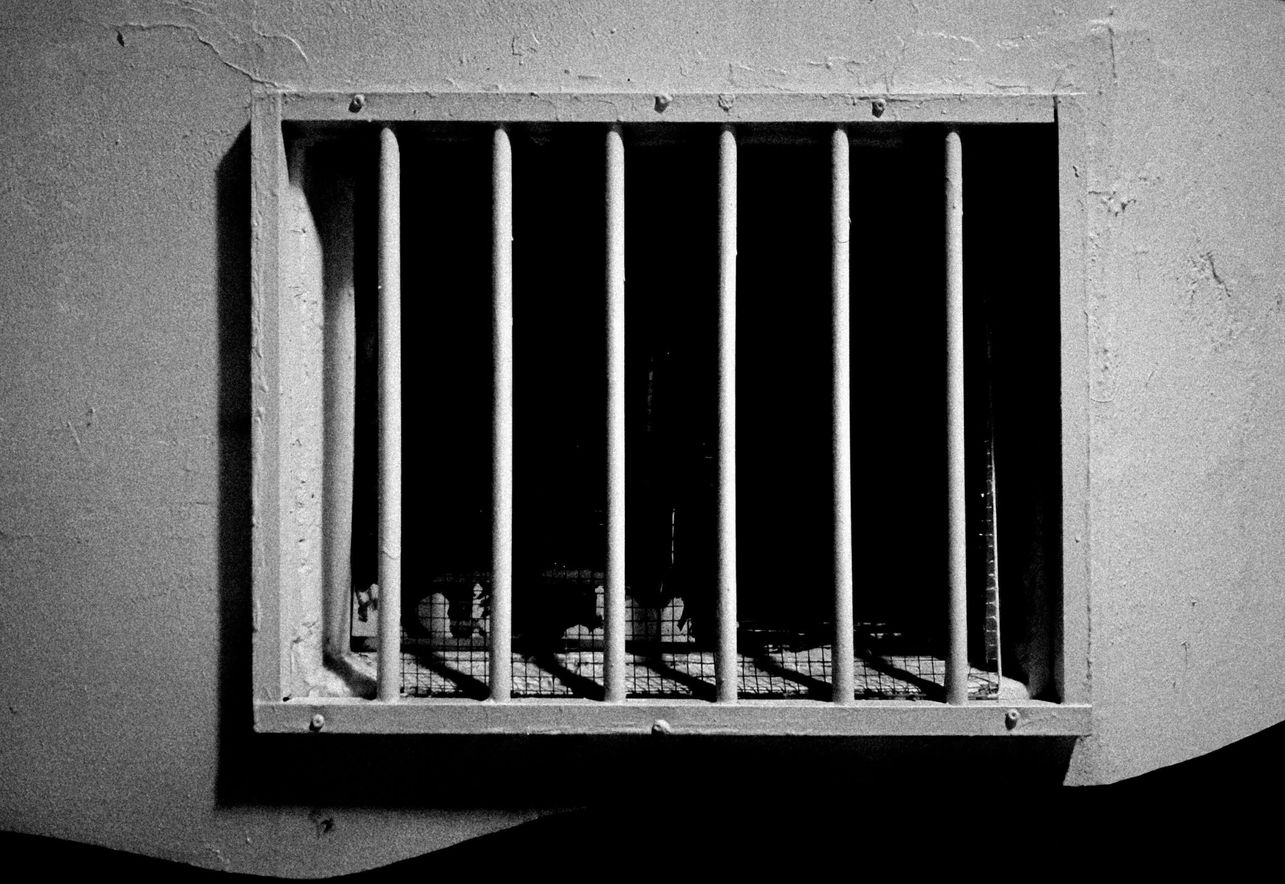 Jail window photo for blog post Bail Pending Appeal Explained on Mickelson Whysall and Moore Law Group Photo by Jeong Yejune on Unsplash